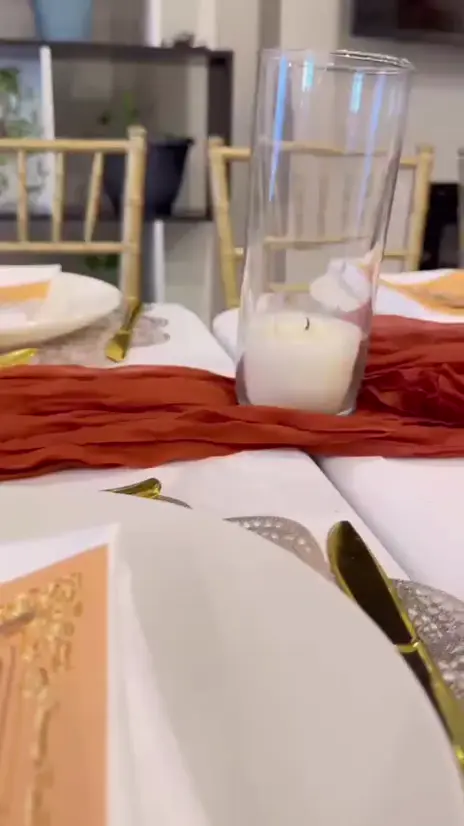 Video: Terracotta runners, gold cutlery and party favours at a baby shower table